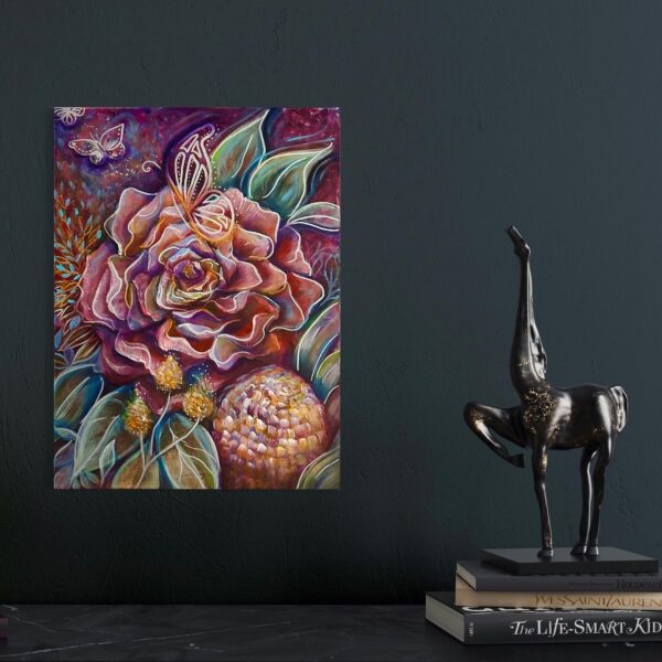 Red rose and Banksia styled on dark grey wall styled with sculpture with gold frame - square